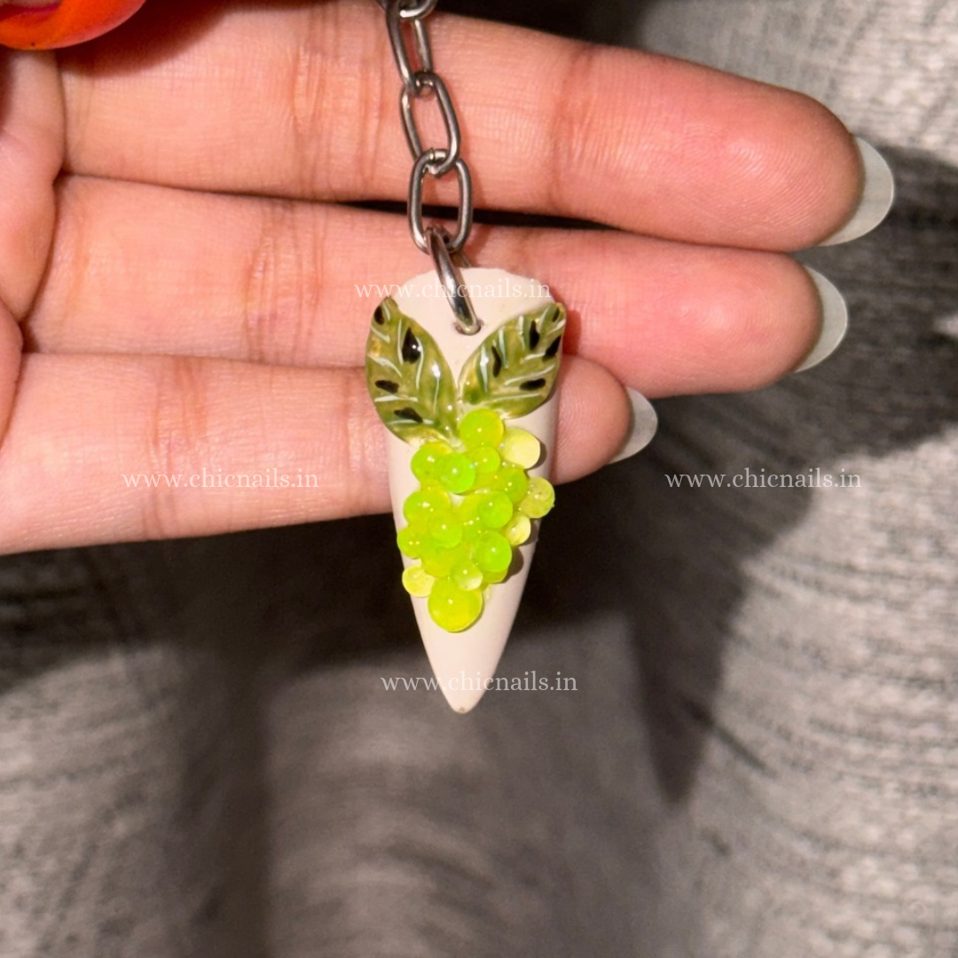 Grapey 3D grape nail keychain by ChicNails India with green grape clusters and leaf detailing on a white nail-shaped base