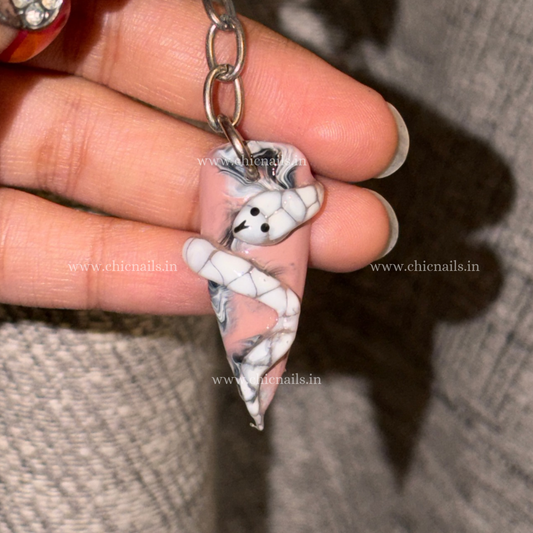 Snakey 3D snake nail keychain by ChicNails India with a white and pink nail-shaped base and detailed snake design