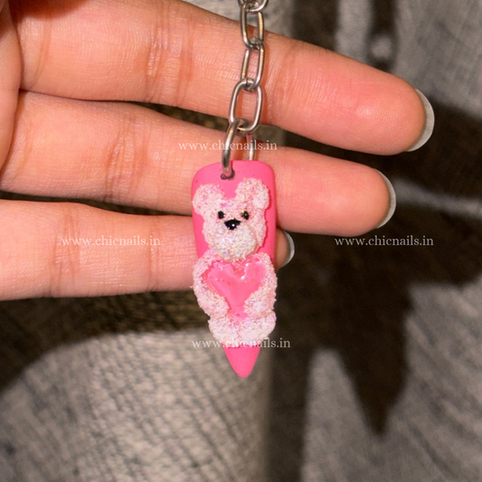 Teddy 3D bear nail keychain by ChicNails India featuring a pink nail-shaped base with a cute teddy bear and heart design