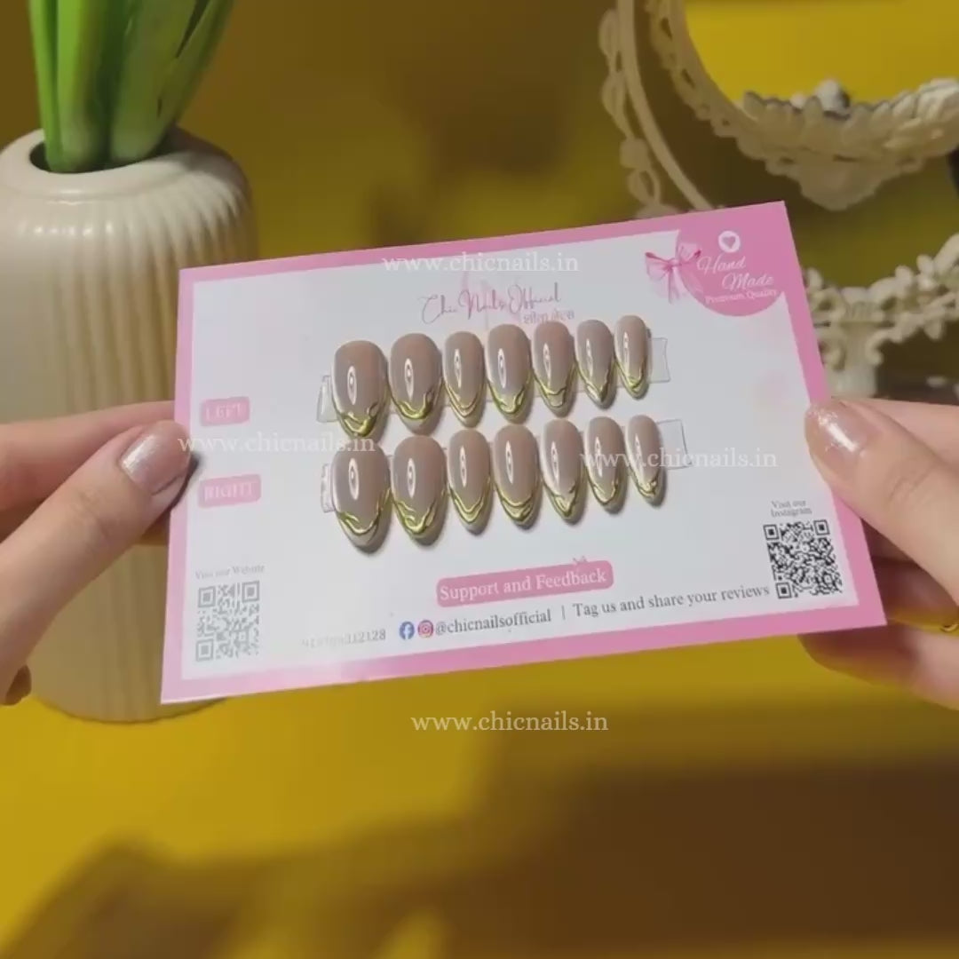 Lumé nude cat eye press on nails with chrome French tips nail art by Chic Nails India