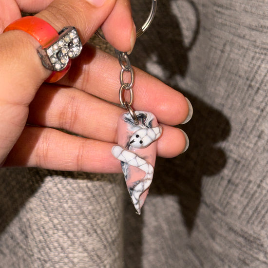 Snakey 3D snake nail keychain by ChicNails India with a white and pink nail-shaped base and detailed snake design