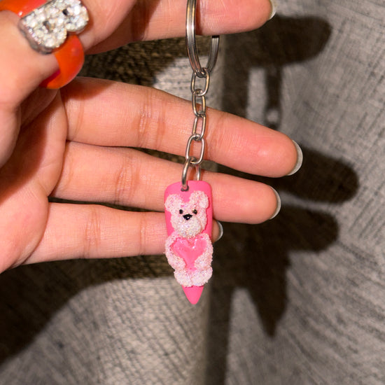 Teddy 3D bear nail keychain by ChicNails India featuring a pink nail-shaped base with a cute teddy bear and heart design