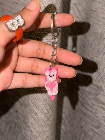 Teddy 3D bear nail keychain by ChicNails India featuring a pink nail-shaped base with a cute teddy bear and heart design