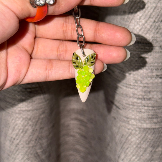 Grapey 3D grape nail keychain by ChicNails India with green grape clusters and leaf detailing on a white nail-shaped base