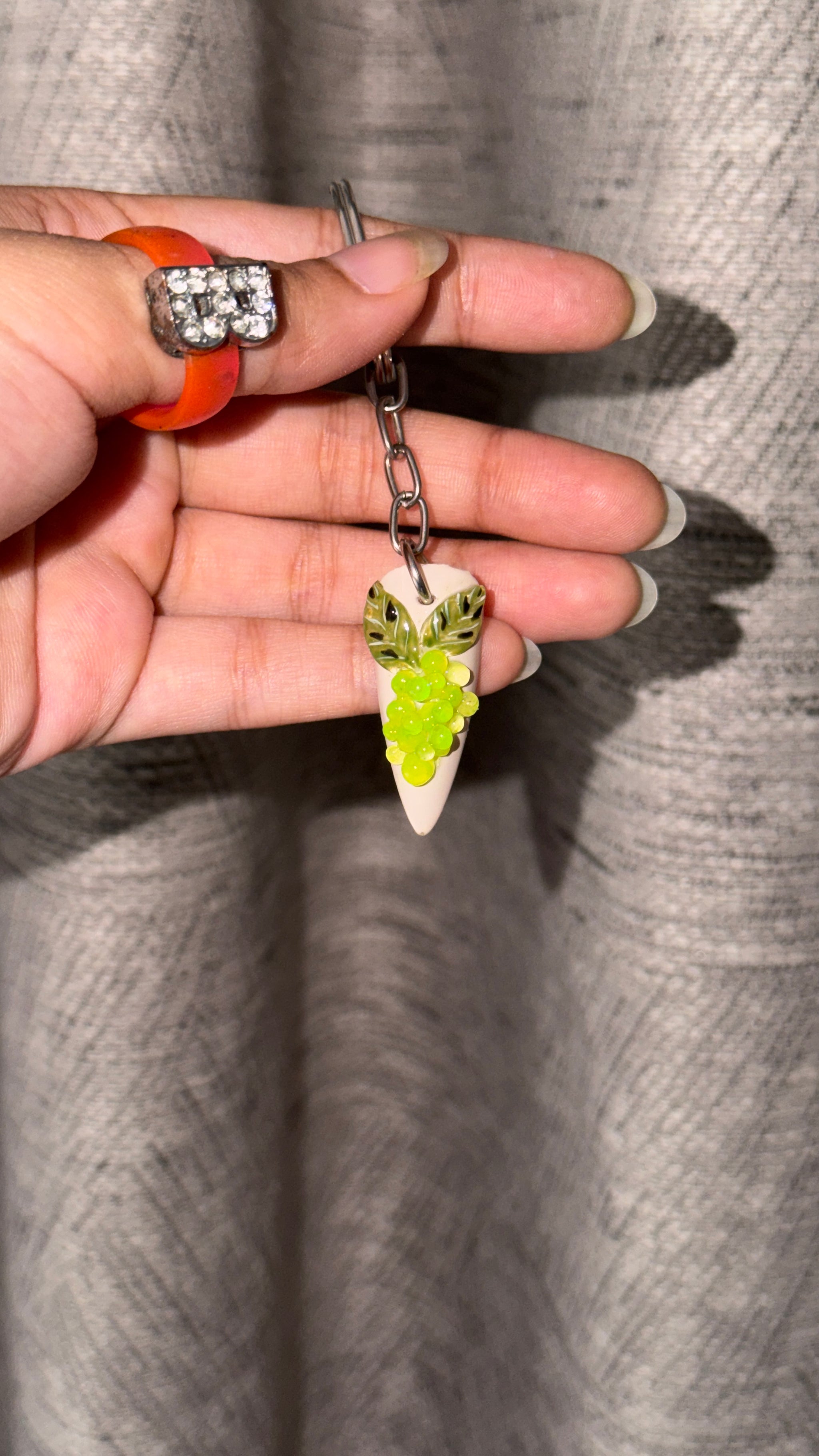 Grapey 3D grape nail keychain by ChicNails India with green grape clusters and leaf detailing on a white nail-shaped base